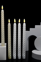 LED candle set with three decorative candles in a modern display, perfect for home decor.
