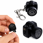 Mini black micro camera for cycling sports, a smart accessory for hands-free recording during bike rides.