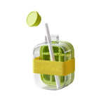 Clear plastic ice cube box for storing and freezing ice cubes, ideal for home or commercial use.