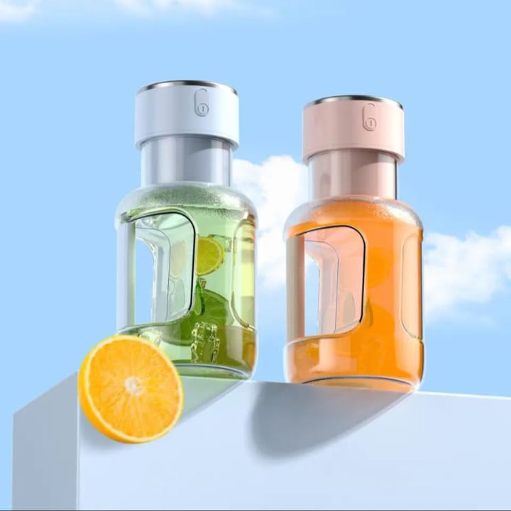 Mini Juicer blender from سوق كوم, compact kitchen tool for fresh fruit and vegetable juices, shows a sleek, portable design.