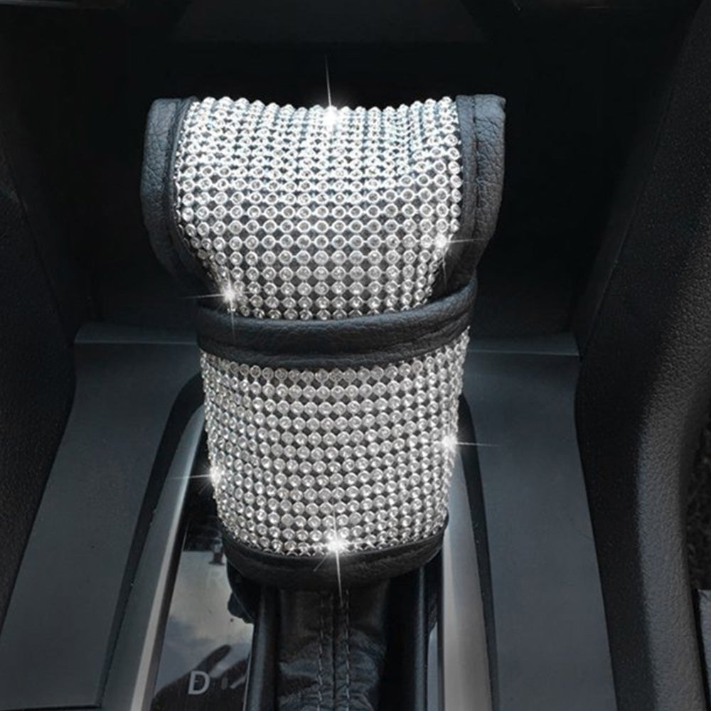 Car gear shift cover accessory in black with textured design, compatible with various vehicle gear sticks.
