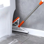 Two-in-one cleaning tool with a brush and sponge, ideal for versatile household cleaning tasks.
