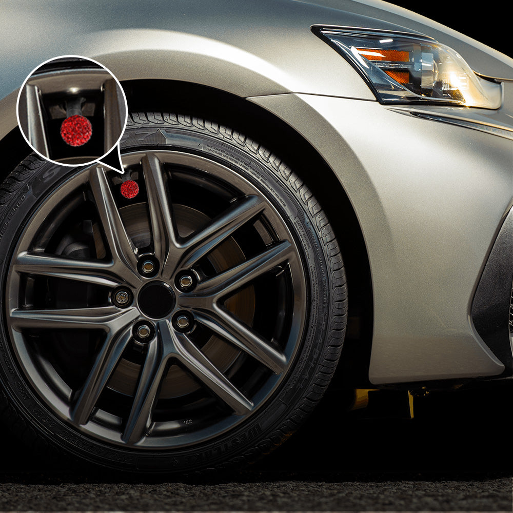 Shiny crystal valve stem caps for car tires, automotive accessories with a sparkling design, perfect for upgrading vehicle details