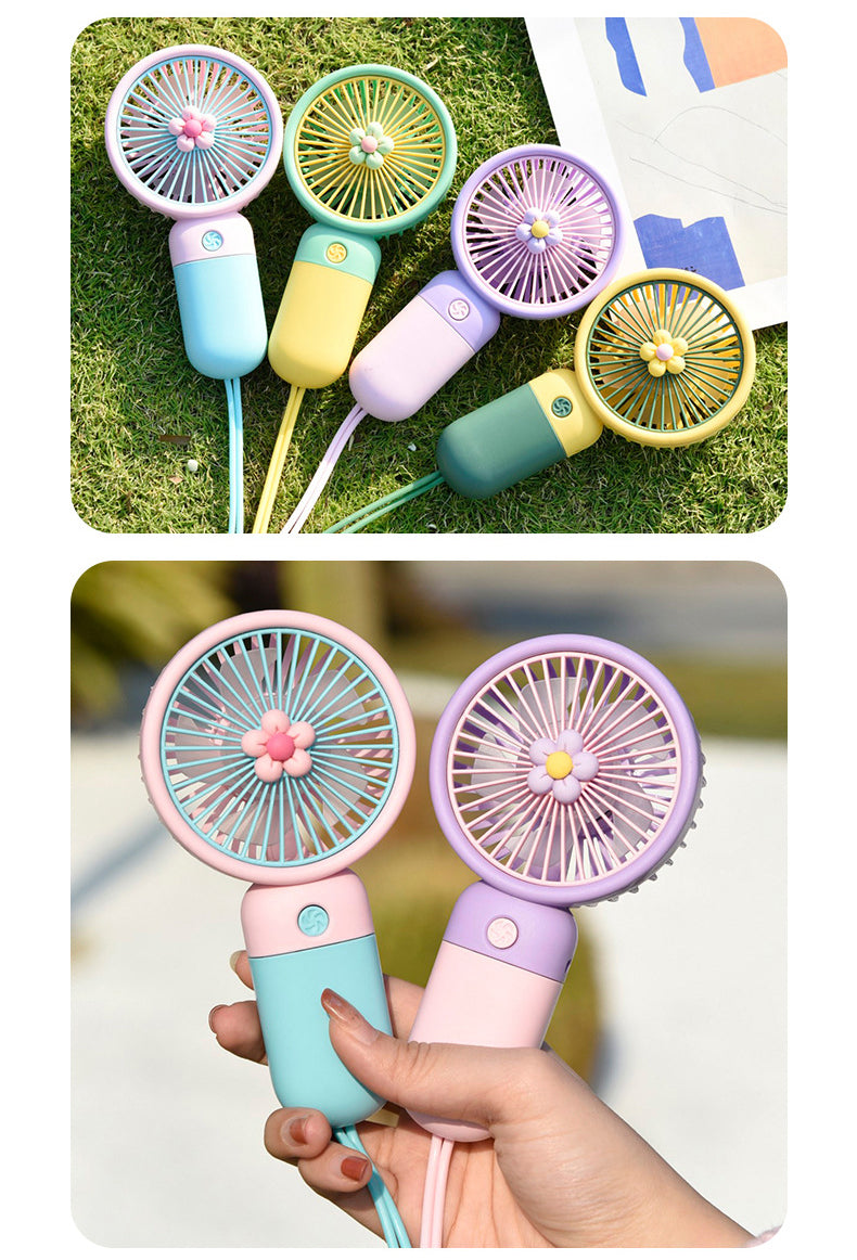 Portable mini fan from سوق كوم, compact handheld cooling device with blades and grip for personal use.
