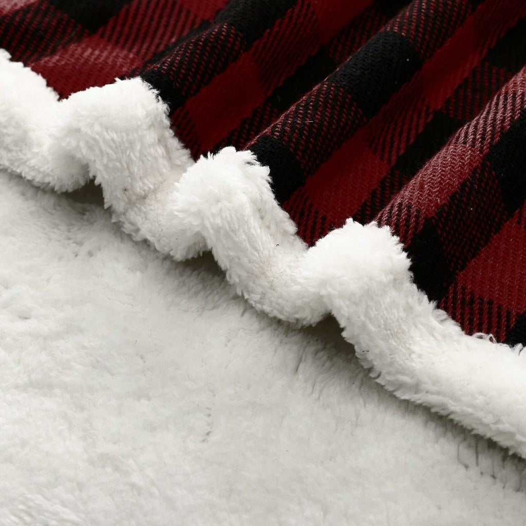 Modern Christmas blanket from سوق كوم, featuring festive woven textile with holiday-themed patterns and cozy fabric.