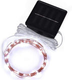 Solar-powered outdoor LED decorative lights with warm glow, ideal for garden or patio lighting.