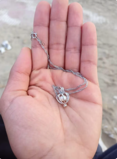 Elegant modern love pearl necklace gift featuring a delicate string of pearls, suitable for special occasions.