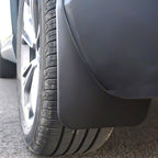 Magnetic car mud flap accessory from سوق كوم, showing a close-up of the durable, flexible mudguard attached to a vehicle.