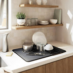 Dish drying mat from سوق كوم, a kitchen tool for drying dishes, featuring a soft, absorbent surface for kitchen convenience.