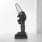 Electric saw from popular market brand سوق كوم, showing the blade and handle for cutting wood and other materials.