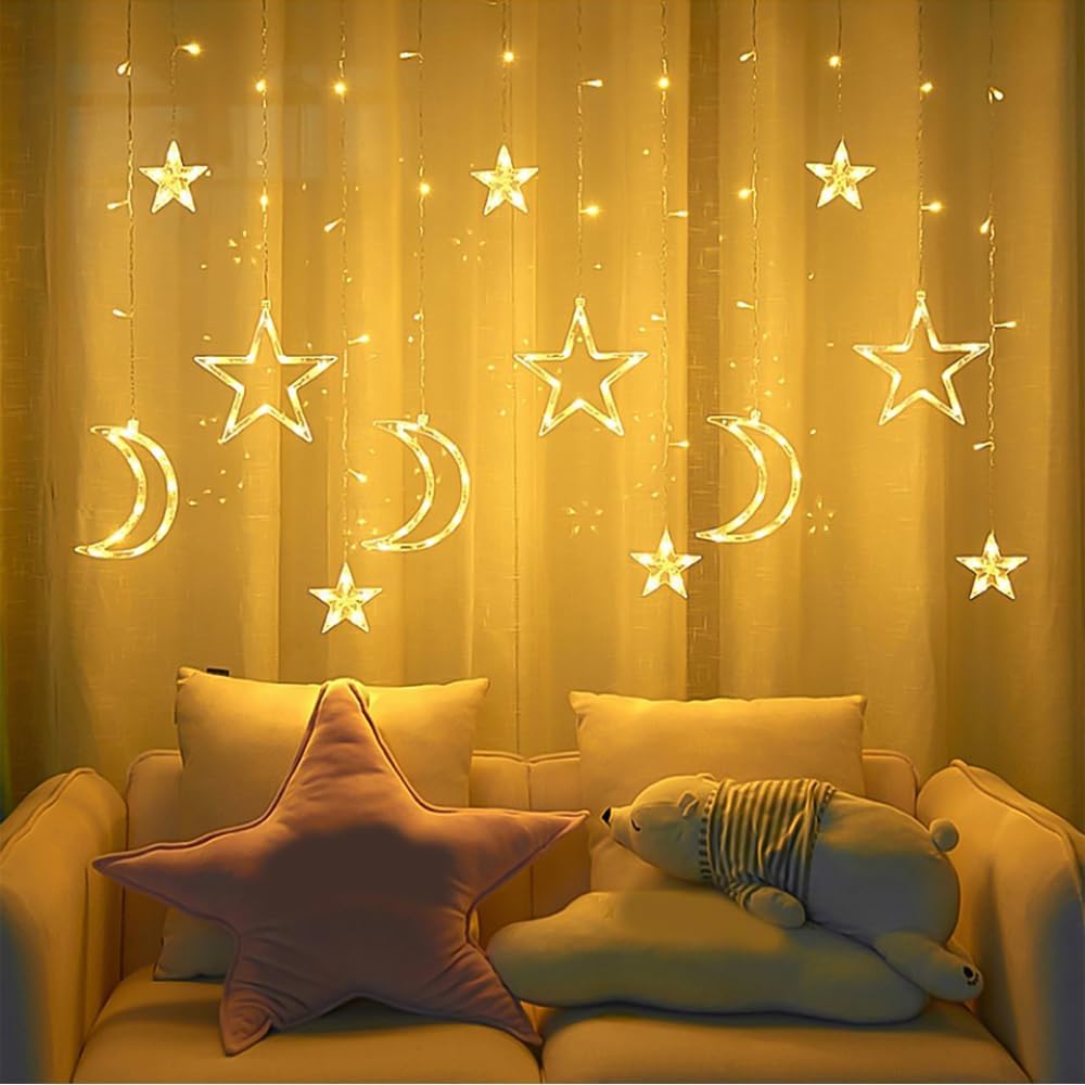 زينة رمضان مضيئة بتصميم نجوم وأهلة بيضاء دافئة