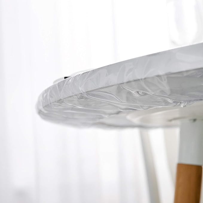 Two expandable dining tablecloths from سوق كوم, showcasing their stretchable fabric and elegant design for home use.