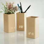 مقلمة و ساعة رقمية