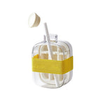 Clear plastic ice cube box with compartments for storing and organizing ice cubes, ideal for kitchen use.