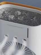 Dual fan and diffuser from سوق كوم, a trendy cooling device with two adjustable fans and aromatic vaporizer in a compact design.