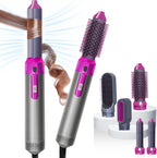 5-in-1 hair straightening brush from سوق كوم showing a sleek black design with multiple brush attachments for versatile styling