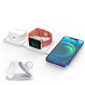 Wireless foldable charger with three-coil design, compatible with smartphones, shown in a closed position with a sleek black finish.