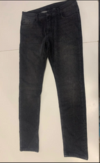 Light blue men's denim jeans from سوق كوم, featuring a classic fit with front and back pockets.