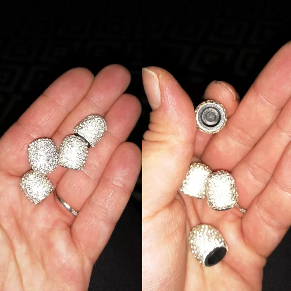 Shiny crystal car tire valve cover accessory with reflective design, used for enhancing vehicle wheels' appearance.