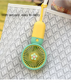 Mini portable fan from سوق كوم, compact personal cooling device with adjustable blades and ergonomic handle for easy use.