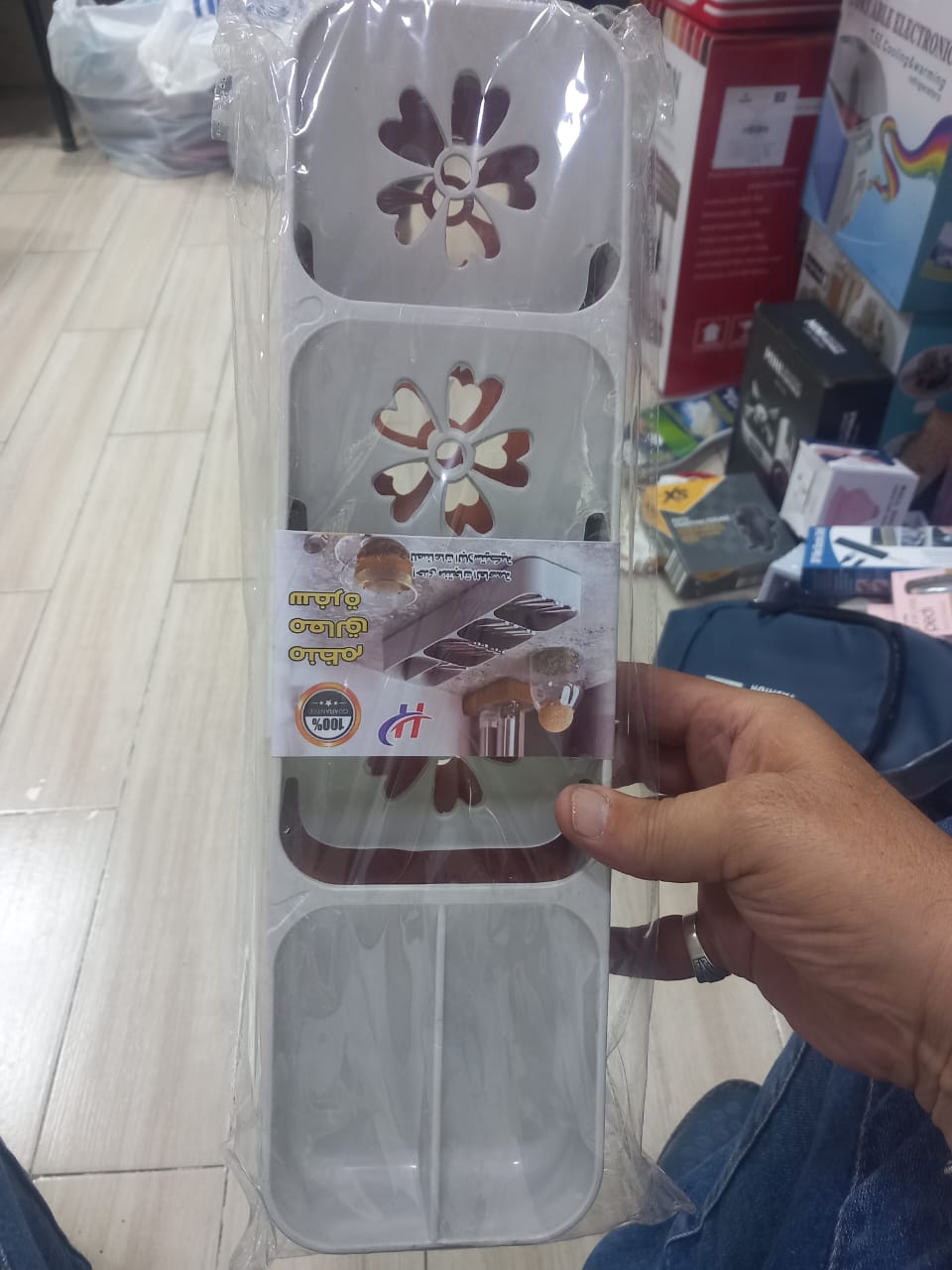 Multifunctional spoon and knife organizer from سوق كوم, a versatile kitchen storage tool with compartments for utensils.